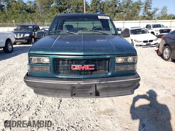 1995 GMC Sierra 1500 z VIN 2GTEC19K7S1585318, wystawiony jako Copart lot #73648904 z przebiegiem 196 568 mil mil oraz Szkoda całkowita • Salvage title. Historia ofert i sprzedaży dostępna na DreamBid. Obrazek 5.