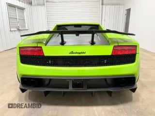 2011 Lamborghini Gallardo Superleggera z VIN ZHWGU7AJXBLA10288, wystawiony jako Copart lot #68198345 z przebiegiem 12 278 mil mil oraz Czysty tytuł • Clean title. Historia ofert i sprzedaży dostępna na DreamBid. Obrazek 6.