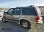 2000 Ford Explorer Eddie Bauer with VIN 1FMDU74E2YZB30465, listed as a Copart auction lot 87244384 with 166,225 mi miles and Salvage title. Bid and sale history available at DreamBid. Image 2.