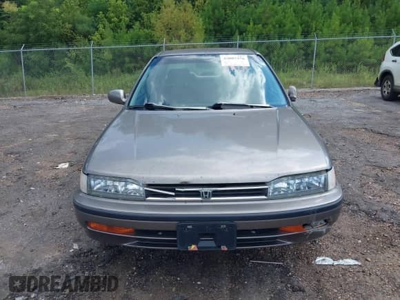 1993 Honda Accord LX z VIN JHMCB7658PC052390, wystawiony jako IAAI lot #43007376 z przebiegiem 276 373 mil mil oraz . Historia ofert i sprzedaży dostępna na DreamBid. Obrazek 6.
