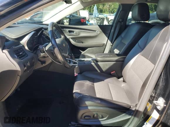 2018 Chevrolet Impala LT with VIN 1G1105S34JU114062, listed as a Copart auction lot 90459015 with 156,686 mi miles and Salvage title. Bid and sale history available at DreamBid. Image 7.