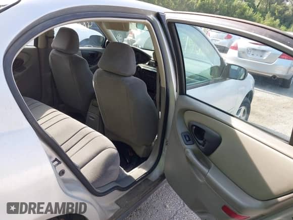 2004 Chevrolet Malibu Classic z VIN 1G1ND52F64M555535, wystawiony jako IAAI lot #42840038 z przebiegiem 134 640 mil mil oraz . Historia ofert i sprzedaży dostępna na DreamBid. Obrazek 8.