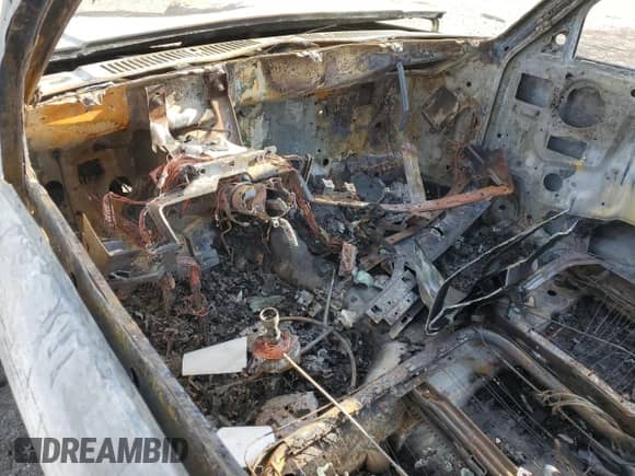 1993 Dodge Dakota z VIN 1B7FL23X8PS195883, wystawiony jako Copart lot #42443235 z przebiegiem Nie podano mil oraz Szkoda całkowita • Salvage title. Historia ofert i sprzedaży dostępna na DreamBid. Obrazek 8.