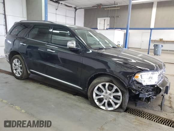 2017 Dodge Durango Citadel with VIN 1C4RDJEG6HC621938, listed as a Copart auction lot 54075305 with 124,285 mi miles and Salvage title. Bid and sale history available at DreamBid. Image 4.