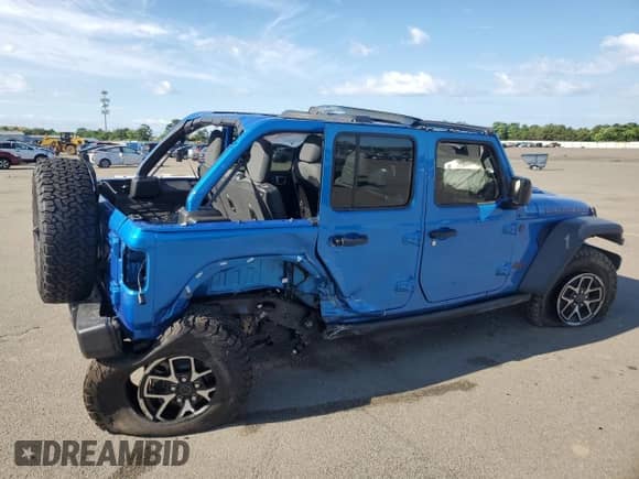 2024 Jeep Wrangler Rubicon with VIN 1C4PJXFG3RW369521, listed as a Copart auction lot 65037115 with 2,499 mi miles and Salvage title. Bid and sale history available at DreamBid. Image 3.