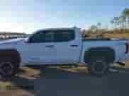 2024 Toyota Tacoma SR5 with VIN 3TYLB5JNXRT041930, listed as a IAAI auction lot 41090783 with 1,237 mi miles and . Bid and sale history available at DreamBid. Image 14.