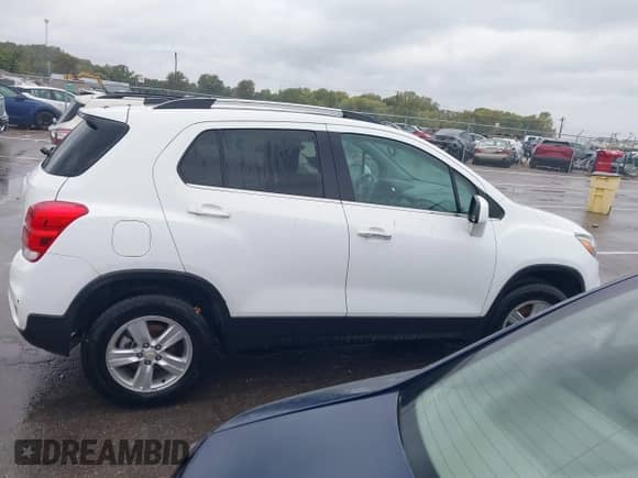 2018 Chevrolet Trax LT z VIN KL7CJPSB3JB606381, wystawiony jako IAAI lot #43568886 z przebiegiem 104 729 mil mil oraz . Historia ofert i sprzedaży dostępna na DreamBid. Obrazek 13.