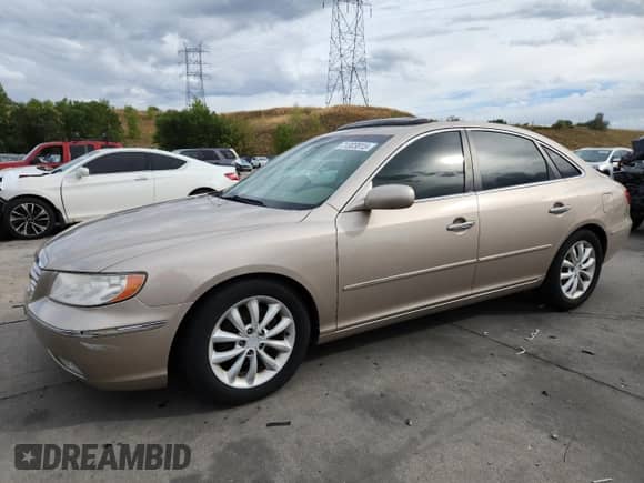 2006 Hyundai Azera SE with VIN KMHFC46F36A121950, listed as a Copart auction lot 71303815 with 125,217 mi miles and Clean title. Bid and sale history available at DreamBid. Image 1.