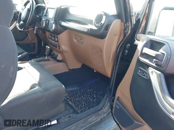 2011 Jeep Wrangler Rubicon with VIN 1J4HA6D14BL508098, listed as a IAAI auction lot 41423284 with 49,840 mi miles and . Bid and sale history available at DreamBid. Image 5.