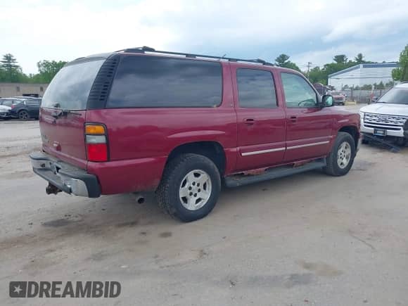 2006 Chevrolet Suburban LS with VIN 1GNFK16Z96J168813, listed as a IAAI auction lot 42392803 with 163,052 mi miles and . Bid and sale history available at DreamBid. Image 4.