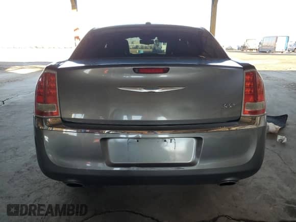 2012 Chrysler 300 Limited с VIN 2C3CCACGXCH309692, выставлен на аукционе Copart как лот 41650025 с пробегом 186 125 миль миль и Списание • Salvage title. История ставок и продаж доступна на DreamBid. Изображение 6.