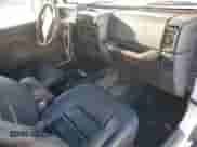 1999 Jeep Wrangler Sport with VIN 1J4FY19SXXP412760, listed as a Copart auction lot 84983895 with 180,172 mi miles and Clean title. Bid and sale history available at DreamBid. Image 8.