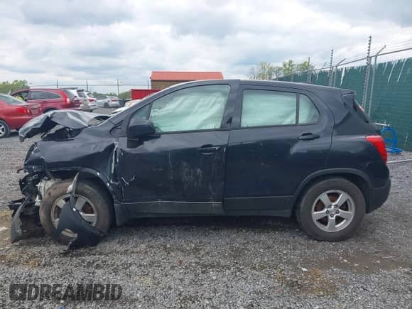 2016 Chevrolet Trax LS with VIN KL7CJNSB1GB612600, listed as a IAAI auction lot 41173692 with 123,296 mi miles and . Bid and sale history available at DreamBid. Image 14.