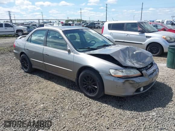 2000 Honda Accord EX with VIN 1HGCG566XYA154787, listed as a IAAI auction lot 42121628 with 225,306 mi miles and . Bid and sale history available at DreamBid. Image 1.