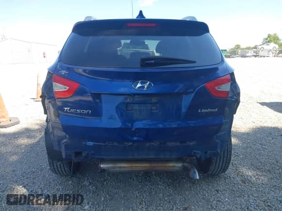 2014 Hyundai Tucson SE with VIN KM8JU3AGXEU804730, listed as a IAAI auction lot 43154883 with 116,472 mi miles and . Bid and sale history available at DreamBid. Image 17.