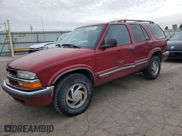 1998 Chevrolet Blazer LT z VIN 1GNDT13W1W2261382, wystawiony jako Copart lot #80436974 z przebiegiem 145 348 mil mil oraz Szkoda całkowita • Salvage title. Historia ofert i sprzedaży dostępna na DreamBid. Obrazek 1.