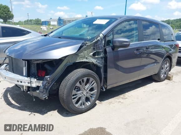 2025 Honda Odyssey Touring with VIN 5FNRL6H87SB009424, listed as a IAAI auction lot 42602484 with 14,823 mi miles and . Bid and sale history available at DreamBid. Image 2.