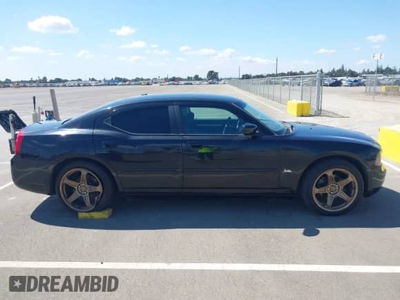 2010 Dodge Charger SXT with VIN 2B3CA3CV6AH227582, listed as a IAAI auction lot 43196146 with 198,848 mi miles and . Bid and sale history available at DreamBid. Image 13.