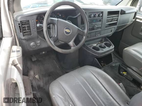 2014 Chevrolet Express Cargo with VIN 1GCSGAFX2E1195454, listed as a Copart auction lot 64240305 with 111,506 mi miles and Salvage title. Bid and sale history available at DreamBid. Image 8.