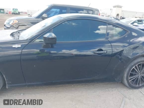 2014 Scion FR-S z VIN JF1ZNAA15E8702674, wystawiony jako IAAI lot #42567313 z przebiegiem 79 850 mil mil oraz . Historia ofert i sprzedaży dostępna na DreamBid. Obrazek 14.