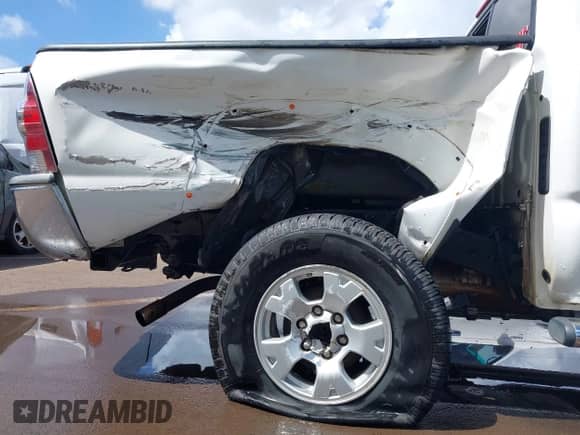 2014 Toyota Tacoma PreRunner z VIN 5TFJX4GN4EX032845, wystawiony jako IAAI lot #41915723 z przebiegiem 163 978 mil mil oraz . Historia ofert i sprzedaży dostępna na DreamBid. Obrazek 6.