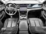 2023 Jeep Grand Cherokee with VIN 1C4RJYB64PC649720, listed as a Copart auction lot 84032325 with 59,572 mi miles and Clean title. Bid and sale history available at DreamBid. Image 8.