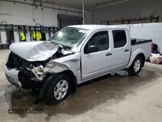 2013 Nissan Frontier Pro-4X with VIN 1N6AD0EV2DN734660, listed as a Copart auction lot 76071404 with 119,163 mi miles and Salvage title. Bid and sale history available at DreamBid. Image 1.