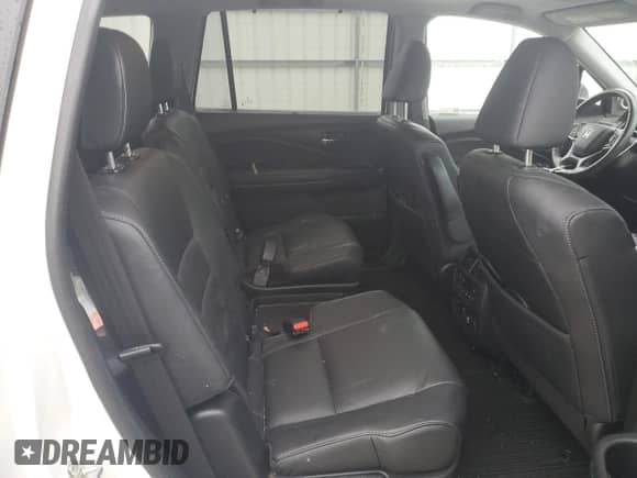 2021 Honda Pilot Touring 7-Passenger с VIN 5FNYF6H66MB037252, выставлен на аукционе Copart как лот 66961365 с пробегом 61 239 миль миль и Списание • Salvage title. История ставок и продаж доступна на DreamBid. Изображение 11.