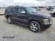 2014 Chevrolet Tahoe LTZ с VIN 1GNSKCE0XER228028, выставлен на аукционе Copart как лот 56971135 с пробегом 155 285 миль миль и Списание • Salvage title. История ставок и продаж доступна на DreamBid. Изображение 4.