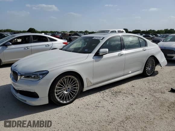 2019 BMW 7 Series with VIN WBA7F2C15KB242462, listed as a Copart auction lot 60916394 with 20,985 mi miles and Salvage title. Bid and sale history available at DreamBid. Image 1.