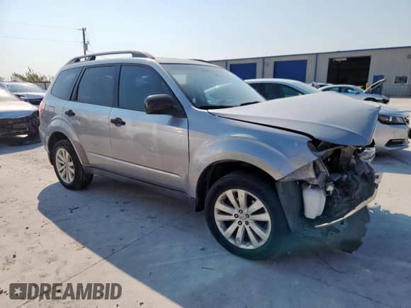 2010 Subaru Forester X with VIN JF2SH6BC9AH913050, listed as a Copart auction lot 81513305 with 147,040 mi miles and Salvage title. Bid and sale history available at DreamBid. Image 4.
