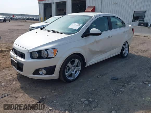 2013 Chevrolet Sonic LTZ with VIN 1G1JE5SB5D4195389, listed as a IAAI auction lot 42400418 with 27,607 mi miles and . Bid and sale history available at DreamBid. Image 2.