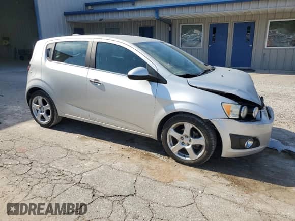2016 Chevrolet Sonic LTZ с VIN 1G1JE6SB0G4151214, выставлен на аукционе Copart как лот 80137935 с пробегом 88 660 миль миль и Списание • Salvage title. История ставок и продаж доступна на DreamBid. Изображение 4.