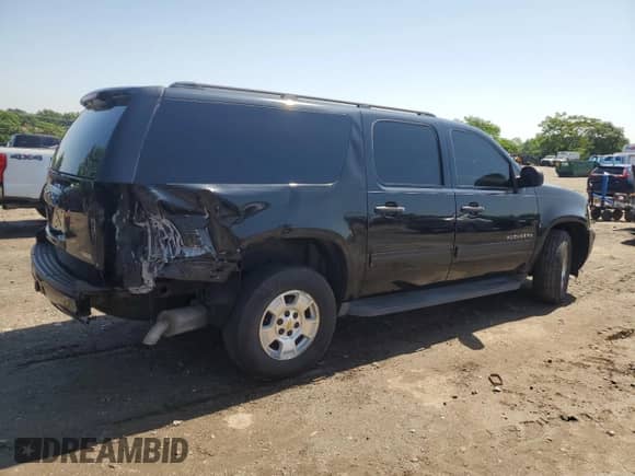 2010 Chevrolet Suburban LS с VIN 1GNUKHE30AR129387, выставлен на аукционе Copart как лот 60620475 с пробегом 141 626 миль миль и Списание • Salvage title. История ставок и продаж доступна на DreamBid. Изображение 3.