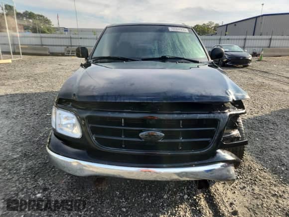 2003 Ford F-150 XL with VIN 1FTRX17223NB72439, listed as a Copart auction lot 70504955 with 288,249 mi miles and Salvage title. Bid and sale history available at DreamBid. Image 5.