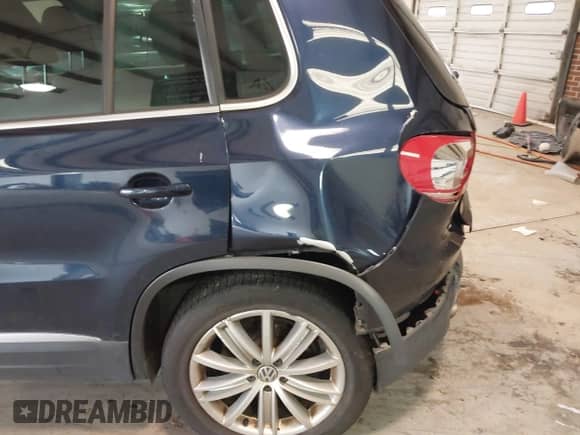 2014 Volkswagen Tiguan SEL with VIN WVGAV3AX8EW563008, listed as a IAAI auction lot 41356523 with 138,211 mi miles and . Bid and sale history available at DreamBid. Image 19.