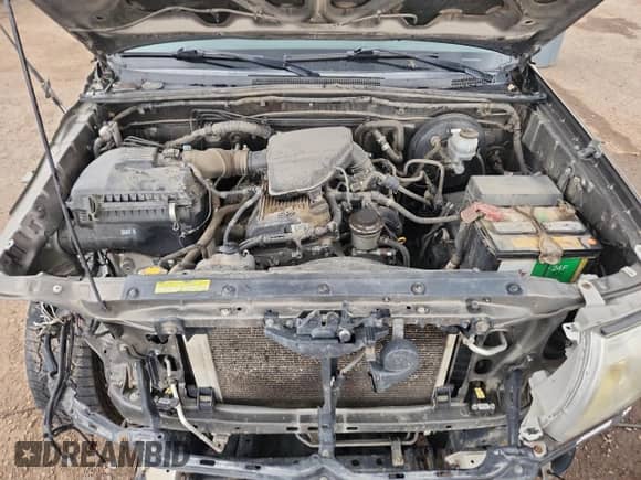 2011 Toyota Tacoma z VIN 5TFUX4ENXBX003376, wystawiony jako Copart lot #70226565 z przebiegiem 183 280 mil mil oraz Szkoda całkowita • Salvage title. Historia ofert i sprzedaży dostępna na DreamBid. Obrazek 11.