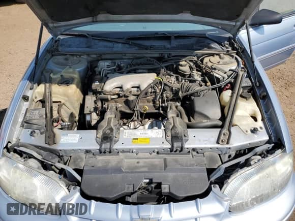 1996 Chevrolet Lumina z VIN 2G1WL52M5T1151271, wystawiony jako Copart lot #71412485 z przebiegiem 242 880 mil mil oraz Szkoda całkowita • Salvage title. Historia ofert i sprzedaży dostępna na DreamBid. Obrazek 11.