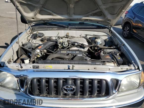 2002 Toyota Tacoma z VIN 5TEWN72NX2Z070220, wystawiony jako Copart lot #81276465 z przebiegiem 143 793 mil mil oraz Szkoda całkowita • Salvage title. Historia ofert i sprzedaży dostępna na DreamBid. Obrazek 11.