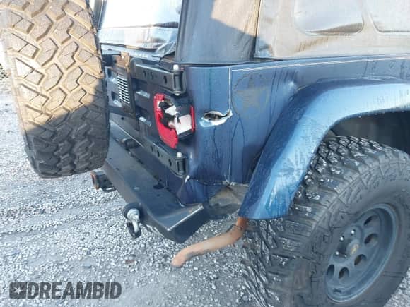 2005 Jeep Wrangler X with VIN 1J4FA39S95P374547, listed as a IAAI auction lot 43500040 with 190,023 mi miles and . Bid and sale history available at DreamBid. Image 17.