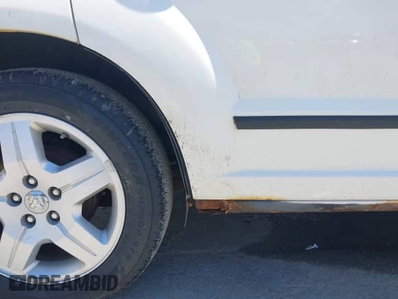 2008 Dodge Caliber SE with VIN 1B3HB28B28D718413, listed as a IAAI auction lot 42775246 with 101,516 mi miles and . Bid and sale history available at DreamBid. Image 6.