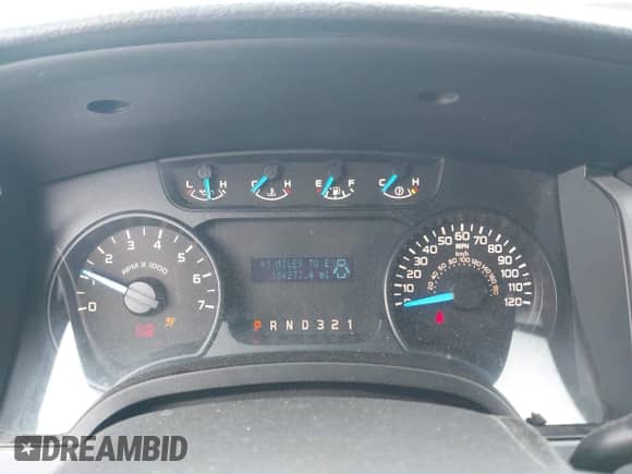 2014 Ford F-150 XL with VIN 1FTMF1CM7EFB62801, listed as a IAAI auction lot 43323235 with 186,000 mi miles and . Bid and sale history available at DreamBid. Image 7.