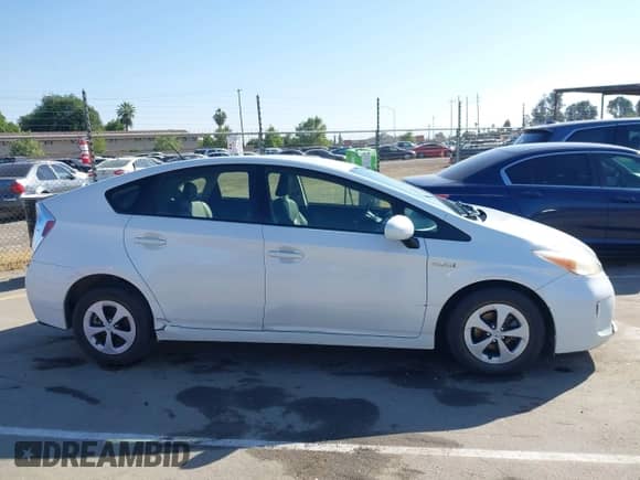 2013 Toyota Prius One with VIN JTDKN3DU4D5575624, listed as a IAAI auction lot 42272217 with 51,817 mi miles and . Bid and sale history available at DreamBid. Image 13.
