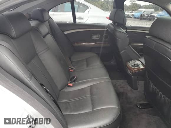2004 BMW 7 Series 745i with VIN WBAGL634X4DP70421, listed as a Copart auction lot 73309744 with 123,457 mi miles and Salvage title. Bid and sale history available at DreamBid. Image 10.
