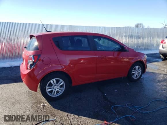 2012 Chevrolet Sonic LS with VIN 1G1JB6SH9C4126979, listed as a Copart auction lot 88278845 with 122,047 mi miles and Clean title. Bid and sale history available at DreamBid. Image 3.