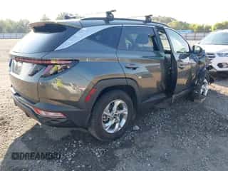 2022 Hyundai Tucson SEL with VIN 5NMJB3AE5NH150901, listed as a IAAI auction lot 43232299 with 72,731 mi miles and . Bid and sale history available at DreamBid. Image 4.