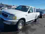 1997 Ford F-150 с VIN 1FTDX08W0VKD14653, выставлен на аукционе IAAI как лот 43563316 с пробегом 123 894 миль миль и . История ставок и продаж доступна на DreamBid. Изображение 2.