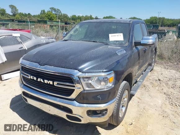 2021 Ram 1500 Lone Star with VIN 1C6RREBT0MN630263, listed as a IAAI auction lot 41887871 with 52,386 mi miles and . Bid and sale history available at DreamBid. Image 2.