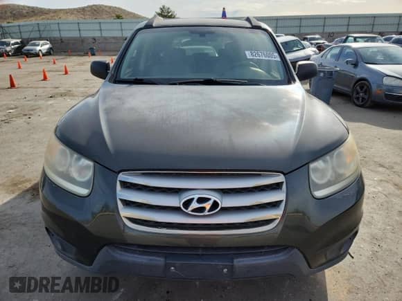 2012 Hyundai Santa Fe GLS z VIN 5XYZG3AB4CG102761, wystawiony jako Copart lot #82676005 z przebiegiem 185 000 mil mil oraz Czysty tytuł • Clean title. Historia ofert i sprzedaży dostępna na DreamBid. Obrazek 5.