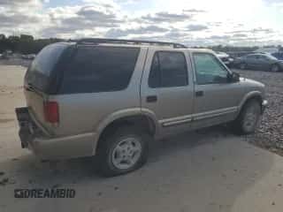 2000 Chevrolet Blazer LS с VIN 1GNDT13W8Y2273628, выставлен на аукционе Copart как лот 85509595 с пробегом 231 629 миль миль и Списание • Salvage title. История ставок и продаж доступна на DreamBid. Изображение 3.